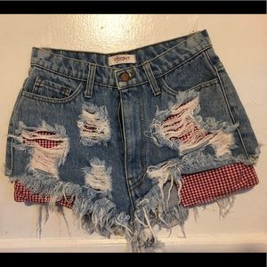 Distressed denim high waisted shorts.